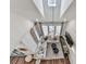 High-angle view of living room with sectional sofa and hardwood floors at 509 Burton Dr # 806, Alpharetta, GA 30009