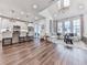 Open concept living and kitchen area with hardwood floors and modern finishes at 509 Burton Dr # 806, Alpharetta, GA 30009