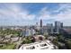 Stunning aerial view of Atlanta skyline, showcasing the city's architecture and urban landscape at 285 Centennial Olympic Park Nw Dr # 1407, Atlanta, GA 30313