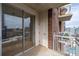 Private balcony with sliding glass doors and exterior storage at 285 Centennial Olympic Park Nw Dr # 1407, Atlanta, GA 30313