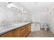 Bathroom with double vanity, bathtub, and tile floors at 285 Centennial Olympic Park Nw Dr # 1407, Atlanta, GA 30313