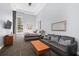 Bedroom with comfortable seating and large window at 285 Centennial Olympic Park Nw Dr # 1407, Atlanta, GA 30313