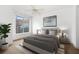 Main bedroom with large window and city view at 285 Centennial Olympic Park Nw Dr # 1407, Atlanta, GA 30313