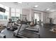 Fitness center with treadmills and other equipment at 285 Centennial Olympic Park Nw Dr # 1407, Atlanta, GA 30313