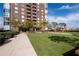 Landscaped lawn area with a walkway at 285 Centennial Olympic Park Nw Dr # 1407, Atlanta, GA 30313