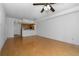 Spacious living room with hardwood floors and ceiling fan at 285 Centennial Olympic Park Nw Dr # 1407, Atlanta, GA 30313