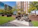Seating area with fire pit and modern chairs at 285 Centennial Olympic Park Nw Dr # 1407, Atlanta, GA 30313