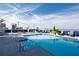 Rooftop pool with plenty of lounge chairs at 285 Centennial Olympic Park Nw Dr # 1407, Atlanta, GA 30313