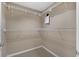 Large walk-in closet with double hanging rods at 285 Centennial Olympic Park Nw Dr # 1407, Atlanta, GA 30313