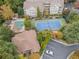 Complex overview: pool, tennis court, and building at 1250 Parkwood Cir # 2312, Atlanta, GA 30339