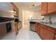 Granite countertops and stainless steel appliances in this kitchen at 1250 Parkwood Cir # 2312, Atlanta, GA 30339