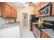 Well-equipped kitchen, stainless steel appliances, granite counters at 1250 Parkwood Cir # 2312, Atlanta, GA 30339