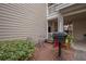 Small apartment patio area with grill and seating at 1250 Parkwood Cir # 2312, Atlanta, GA 30339