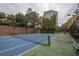 Well-maintained tennis court with blue surface at 1250 Parkwood Cir # 2312, Atlanta, GA 30339