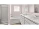 Clean bathroom features double vanity, tub, and shower at 616 Kimberwick Dr, Locust Grove, GA 30248