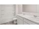 Bathroom with double vanity, tub and shower at 616 Kimberwick Dr, Locust Grove, GA 30248