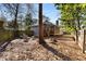 Spacious backyard features a fire pit, perfect for outdoor entertaining, and screened porch at 889 City Park Se Dr, Atlanta, GA 30312