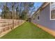 Lush backyard with well-maintained lawn and privacy fence at 889 City Park Se Dr, Atlanta, GA 30312