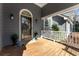 Inviting front porch with decorative wreath, potted plants, and a 'Welcome' mat at 889 City Park Se Dr, Atlanta, GA 30312