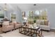 A naturally bright living room with a fireplace and comfortable, plush seating at 889 City Park Se Dr, Atlanta, GA 30312