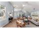 Inviting living room with vaulted ceilings, lots of natural light, and wood flooring at 889 City Park Se Dr, Atlanta, GA 30312