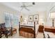 Cozy bedroom with a wooden bed frame and plenty of natural light at 11 Ivy Chase Ne, Atlanta, GA 30342