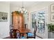 Charming dining area with wooden table and chairs, and access to deck at 11 Ivy Chase Ne, Atlanta, GA 30342