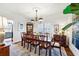 Formal dining room with hardwood floors, chandelier, and elegant table setting at 11 Ivy Chase Ne, Atlanta, GA 30342