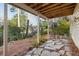 Stone patio under deck, perfect for relaxing outdoors at 11 Ivy Chase Ne, Atlanta, GA 30342