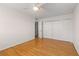 Bright bedroom with hardwood floors, ceiling fan, and closet at 1445 Monroe Ne Dr # B7, Atlanta, GA 30324