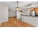 Cozy breakfast nook with stainless steel appliances and modern light fixture at 1445 Monroe Ne Dr # B7, Atlanta, GA 30324