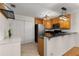 Cozy kitchen with stainless steel appliances, wine rack and unique pendant lighting at 1445 Monroe Ne Dr # B7, Atlanta, GA 30324