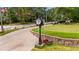 Scenic putting green with vintage clock tower and golf carts near a bridge in lush Ansley neighborhood at 1445 Monroe Ne Dr # B7, Atlanta, GA 30324