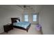 Bright bedroom with a queen bed, and a beanbag chair at 4038 Ash Tree St, Snellville, GA 30039