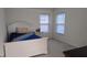 Bedroom with a twin-size bed and ample natural light at 4038 Ash Tree St, Snellville, GA 30039