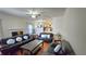 Spacious living room featuring hardwood floors and a view into the kitchen at 4038 Ash Tree St, Snellville, GA 30039