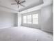 Spacious bedroom with carpeted floor and ceiling fan at 927 Katie Kerr Dr, Decatur, GA 30030