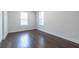 Bedroom with dark hardwood floors and bright windows at 927 Katie Kerr Dr, Decatur, GA 30030