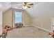 Bedroom with vaulted ceiling, carpet, and a ceiling fan at 3030 Keeneland Blvd, Mcdonough, GA 30252