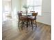 Kitchen breakfast nook with four-chair table at 3245 Sharon Dr, Powder Springs, GA 30127