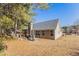 House back view, showcasing backyard and patio area at 4749 Brookwood Vw, Atlanta, GA 30349