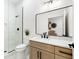 Modern bathroom with a frameless glass shower and updated vanity at 500 Ridgewater Dr, Marietta, GA 30068