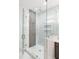 Large walk-in shower with marble tile and gold fixtures at 500 Ridgewater Dr, Marietta, GA 30068