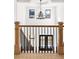 Elegant staircase with wood railings and a modern chandelier at 500 Ridgewater Dr, Marietta, GA 30068