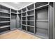 Spacious walk-in closet with ample shelving and hanging space at 500 Ridgewater Dr, Marietta, GA 30068