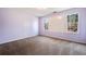 Empty bedroom with carpet, neutral paint and bright windows at 40 Brompton Dr, Dallas, GA 30157