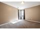 Unfurnished bedroom with carpet, neutral paint and natural light at 40 Brompton Dr, Dallas, GA 30157