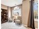 Bedroom with a seating area, large windows and natural light at 40 Brompton Dr, Dallas, GA 30157