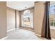 Bedroom featuring a large window with a view and neutral carpet at 40 Brompton Dr, Dallas, GA 30157