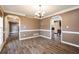 Dining room with hardwood floors, neutral paint, and natural lighting at 40 Brompton Dr, Dallas, GA 30157